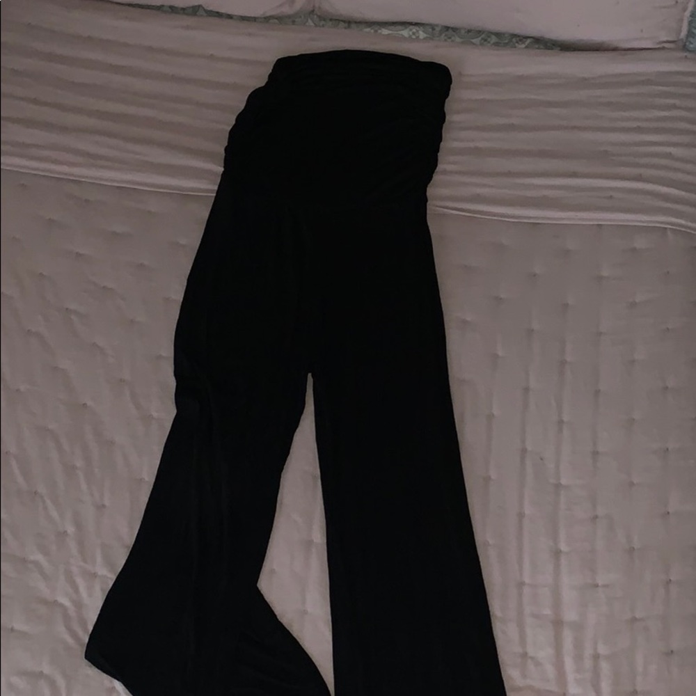 Black strapless jump suit/ romper.